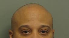 Authorities searched Friday for a convicted murderer from Indiana who was mistakenly released after a Chicago court appearance, as officials in Illinois admitted they lost paperwork directing them to return him to Indiana.